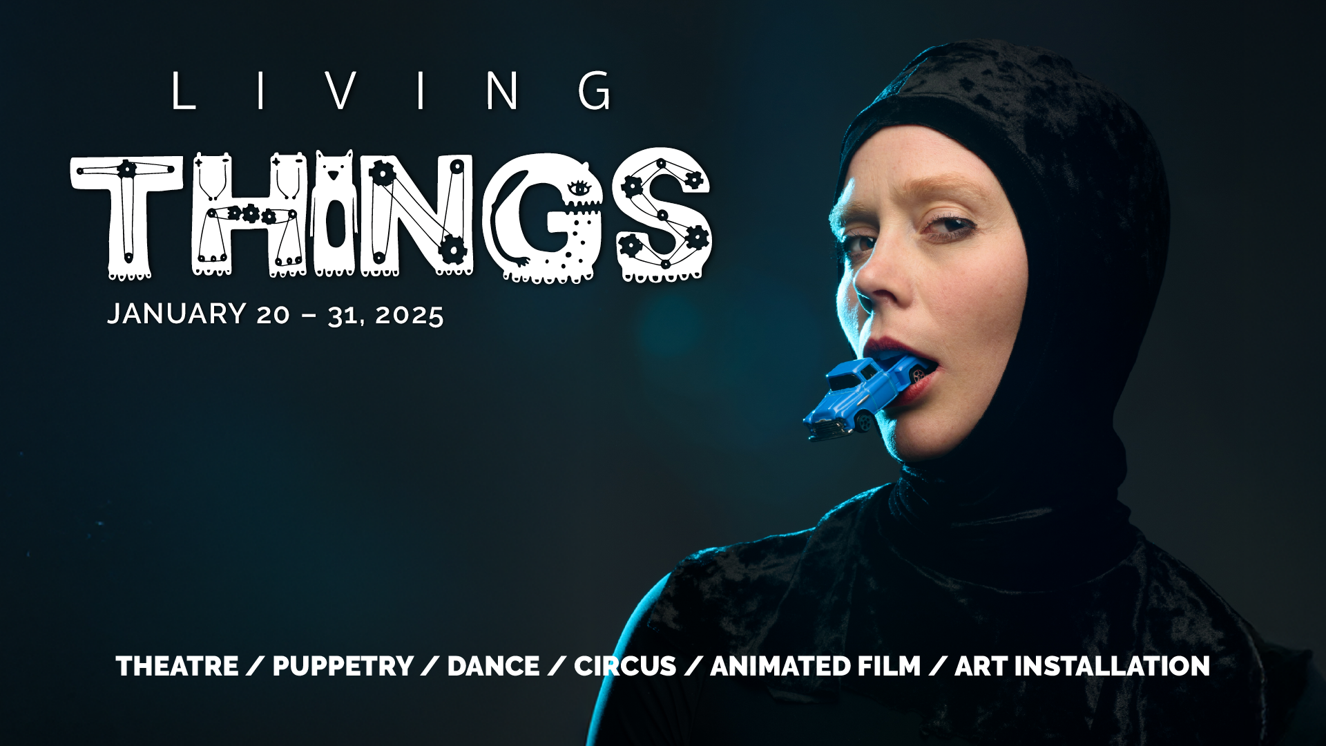 Living Things January 20-31, 2025 - THEATRE/PUPPETRY/DANCE/CIRCUS/ANIMATED FILM/ART INSTALLATION - photo of Ingrid Hansen (Epidermis Circus) in black hooded one piece with a bright blue toy truck coming out of her mouth.